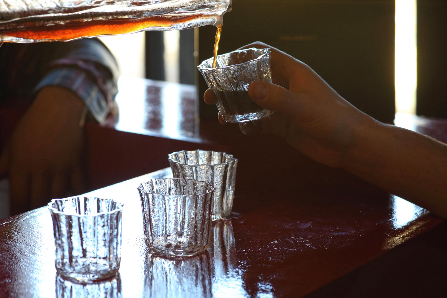 Underground Pico shot glasses on a bar counter for a trendy party setting